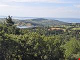 16.381,11 SQUARE METERS OF LAND CLOSE TO THE VILLAGE WITH FULL BOSPHORUS AND BRIDGE VIEW IN LAPSEKİ TAŞTEPE