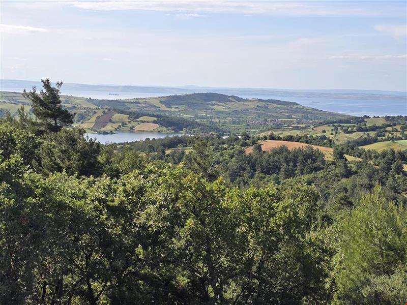 16.381,11 SQUARE METERS OF LAND CLOSE TO THE VILLAGE WITH FULL BOSPHORUS AND BRIDGE VIEW IN LAPSEKİ TAŞTEPE