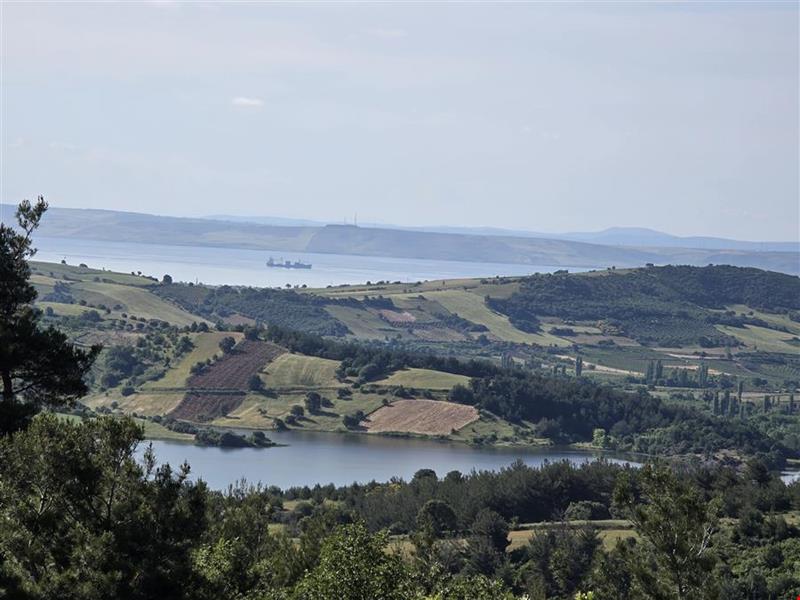16.381,11 SQUARE METERS OF LAND CLOSE TO THE VILLAGE WITH FULL BOSPHORUS AND BRIDGE VIEW IN LAPSEKİ TAŞTEPE