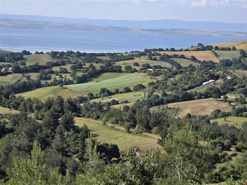 16.381,11 SQUARE METERS OF LAND CLOSE TO THE VILLAGE WITH FULL BOSPHORUS AND BRIDGE VIEW IN LAPSEKİ TAŞTEPE